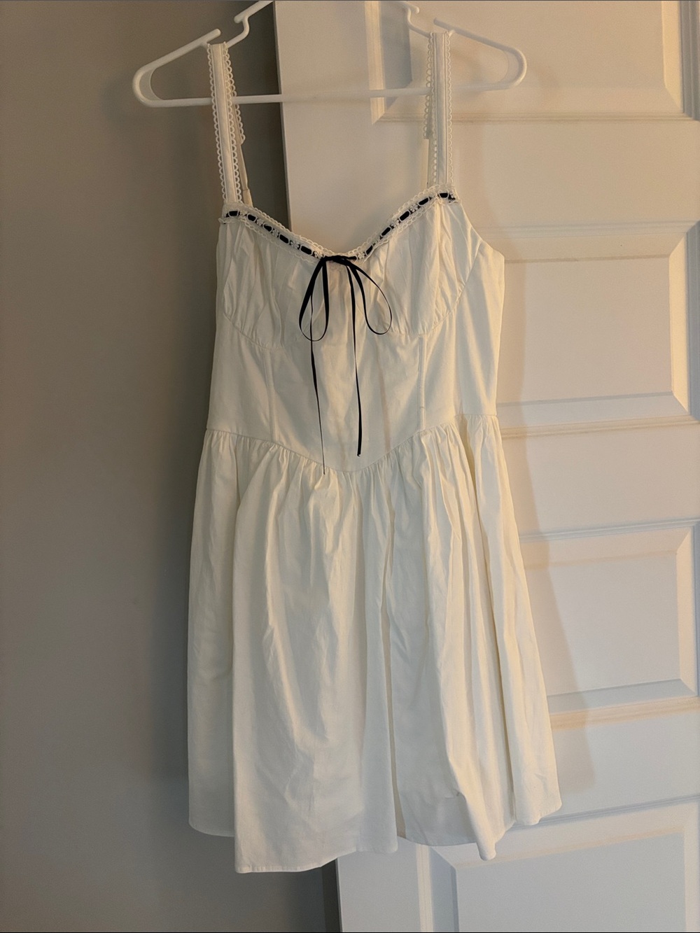 Lulu's White Mini Dress with Black Bow
